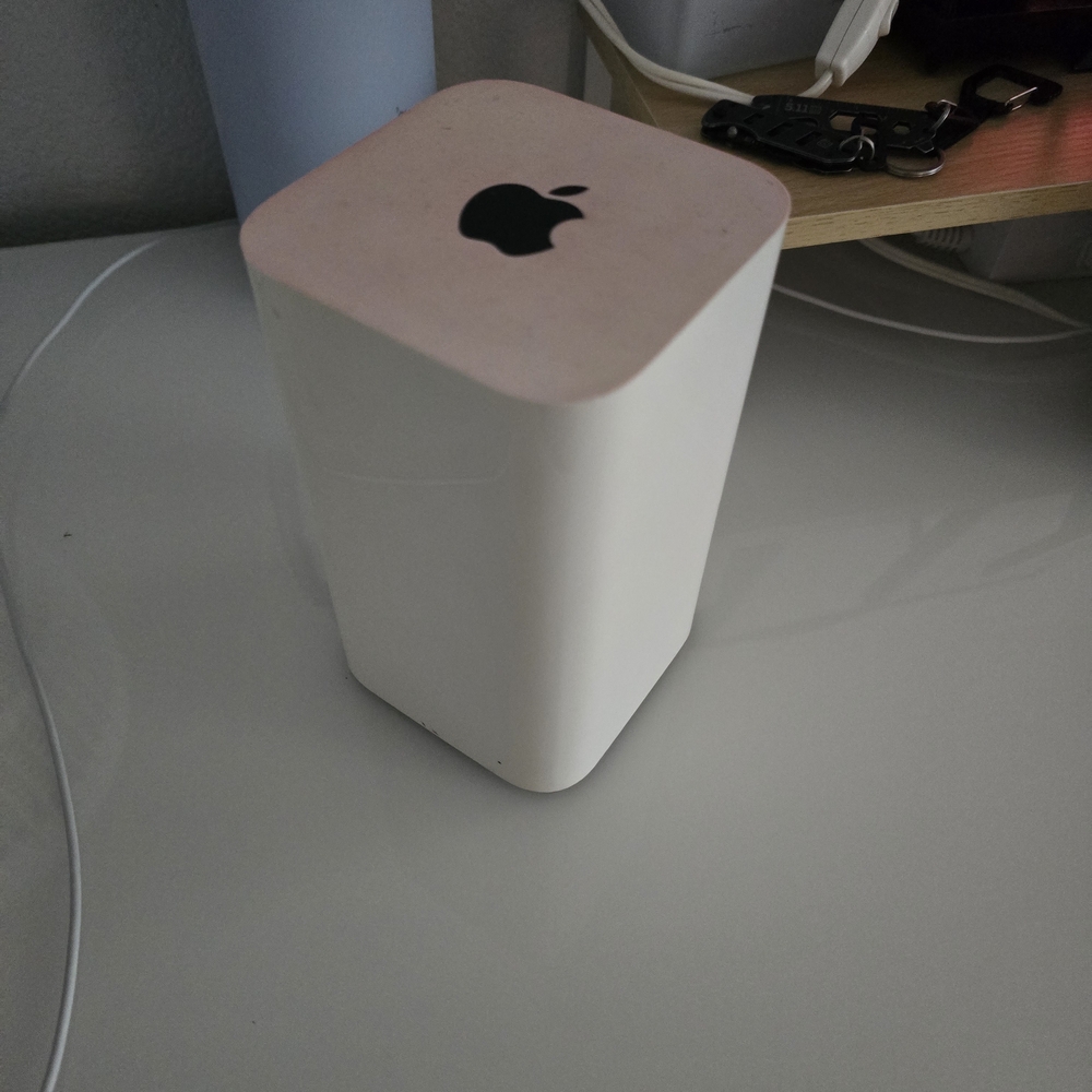 Apple White and Pink Device